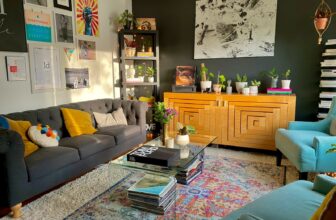 brown wooden cabinet near gray couch