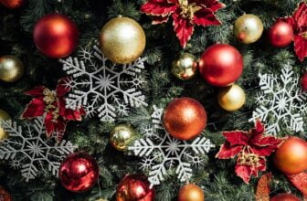 a christmas tree with red and gold ornaments