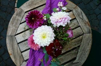White, Pink, and Purple Flowers on Table